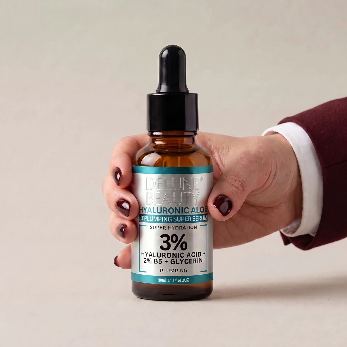 Hand holding Delune Hyaluronic Aloe Face Serum