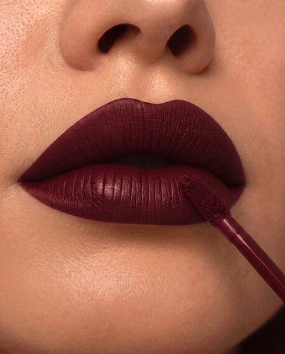 LuxMatte 24-Hour Lipstick in Cabernet Kiss on lips