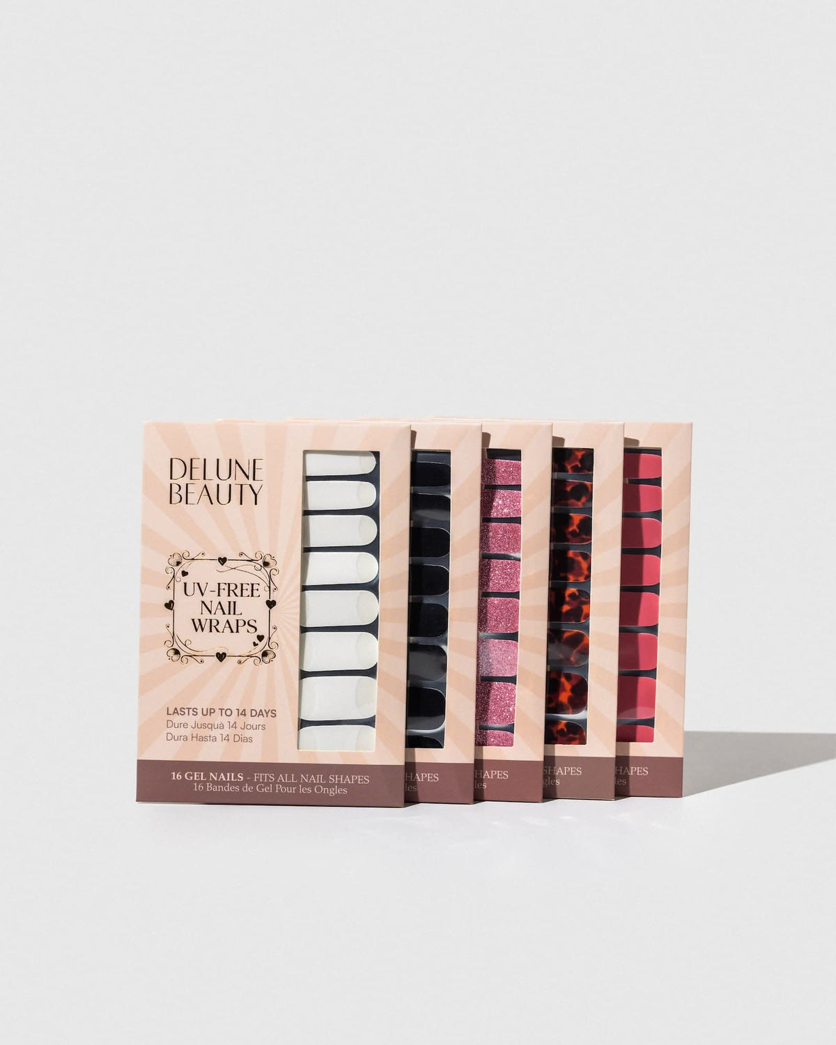 French Manicure (Part Transparent) (Non-UV Nail Wraps): row of Delune Beauty UV-free nail wrap packs standing upright